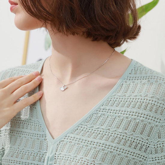 COMOBOCA Women's V-Neck Ruched Knit T-Shirt