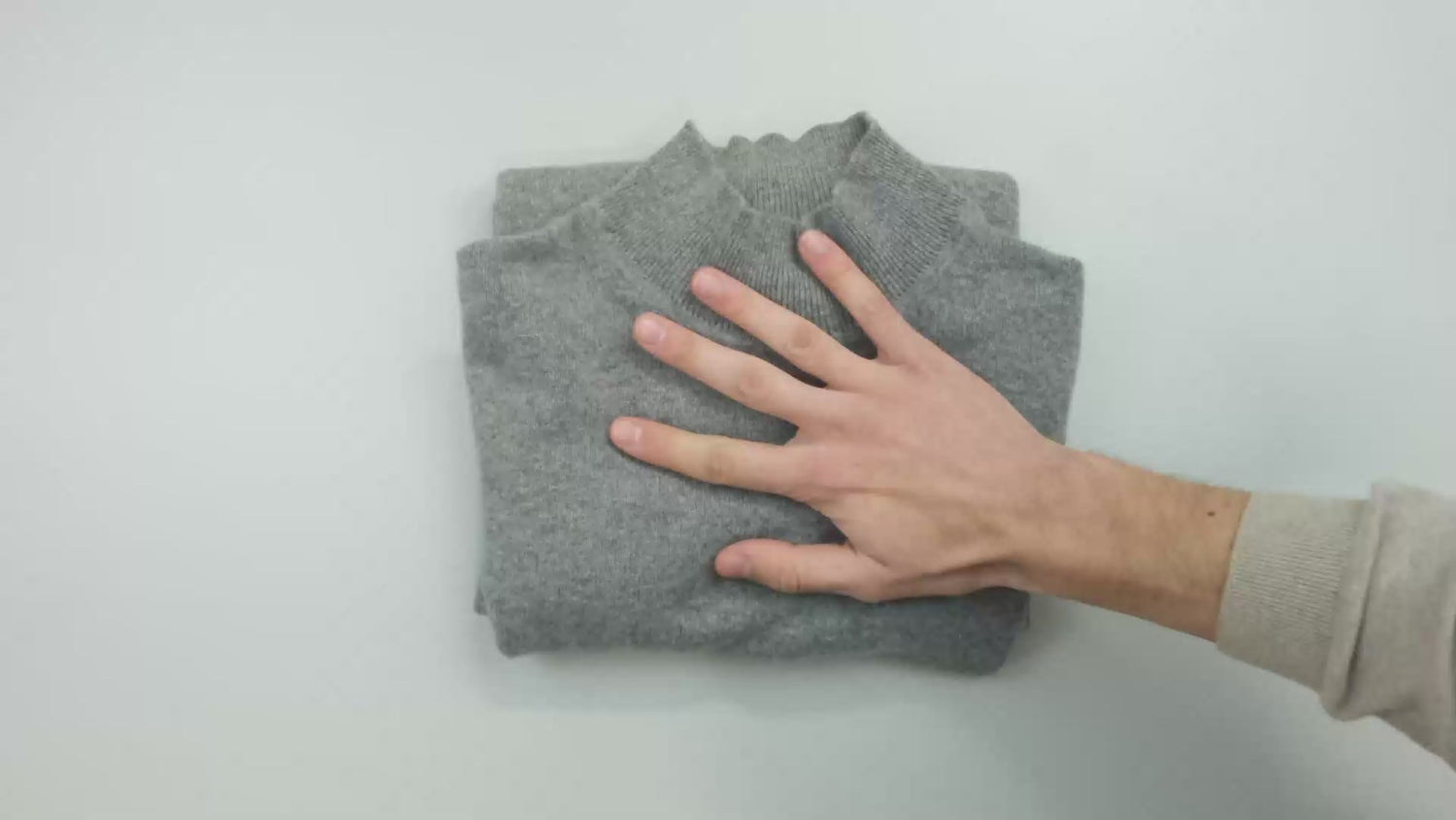 The video shows how to hand wash cashmere from COMOBOCA